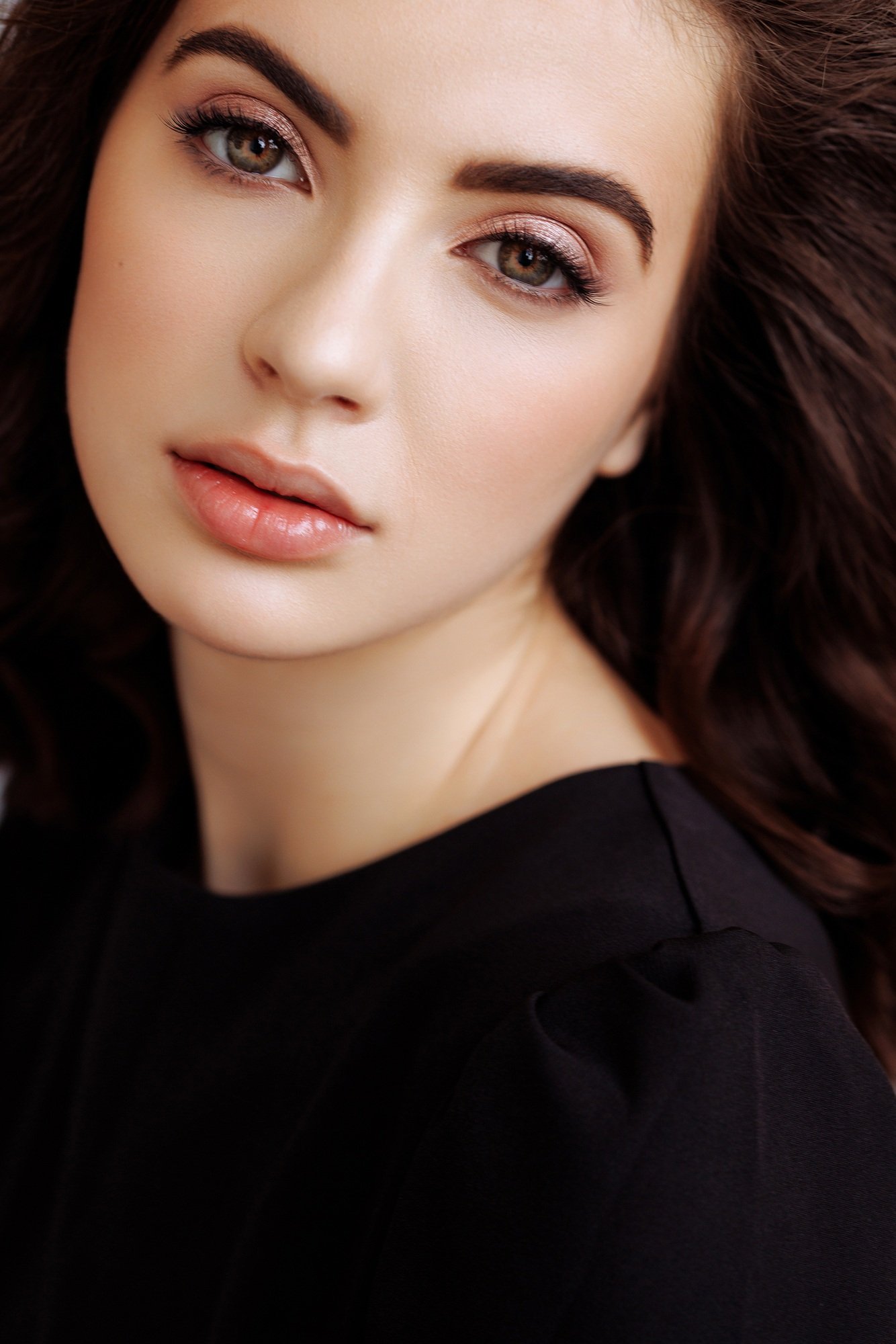 Beautiful woman face close up healthy skin care.